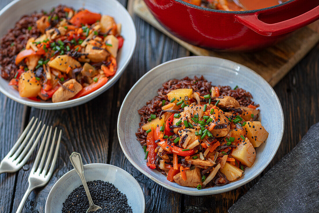 Sweet and sour chicken with pineapple, vegetables and rice