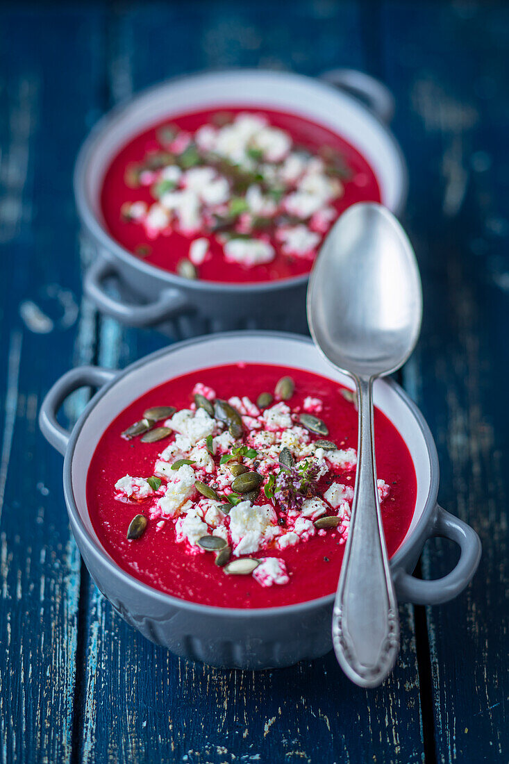 Cream of beetroot soup with feta and pumpkin seeds