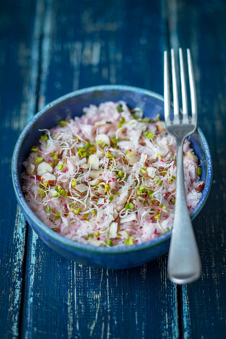 Radish salad with apple and sprouts