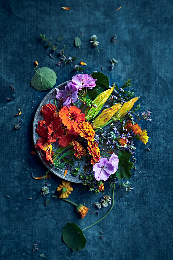 Variety of edible flowers on a plate