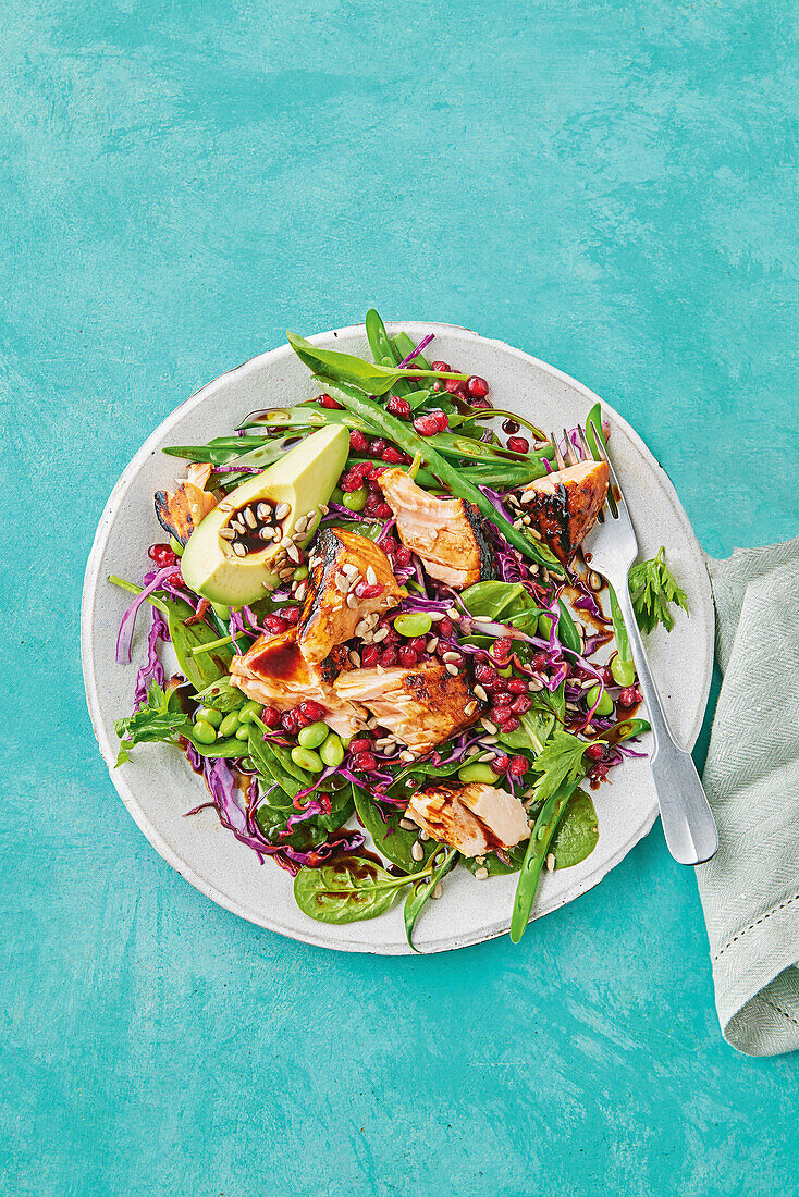 Salmon and avocado salad with pomegranate dressing