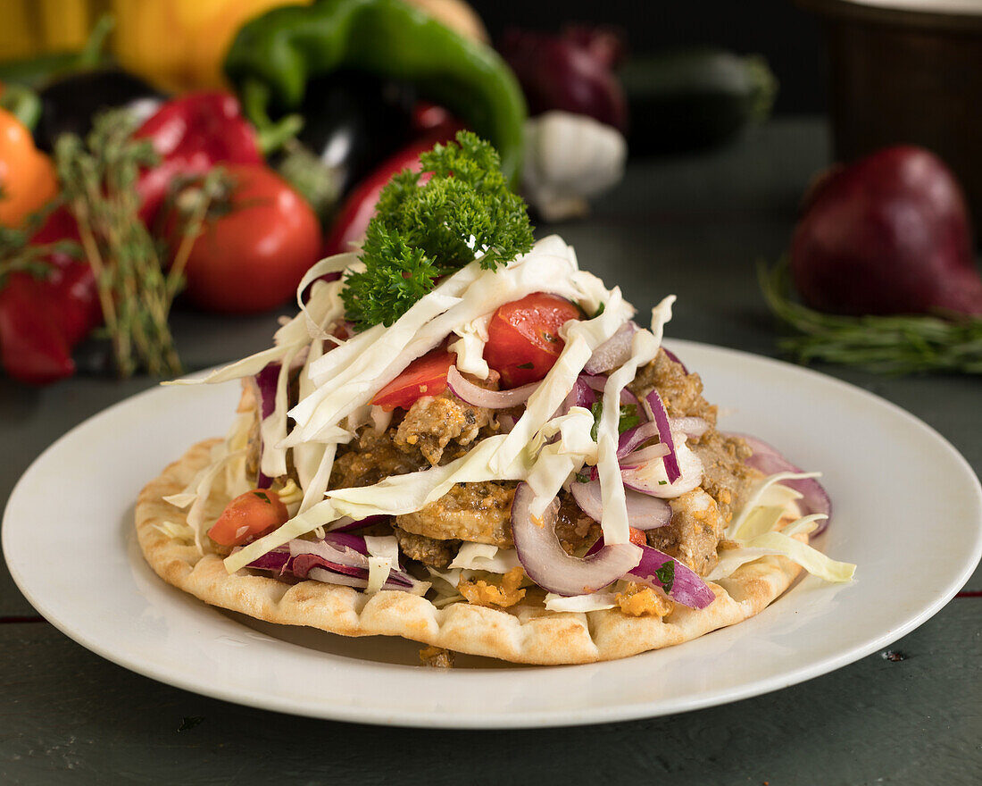 Gyros pita with coleslaw and tomato