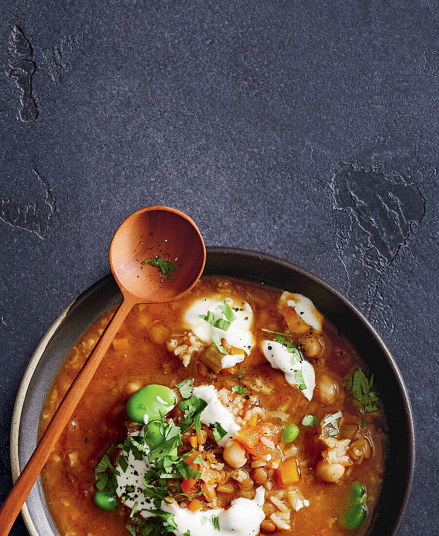 Vegetable harira soup with yoghurt and herbs