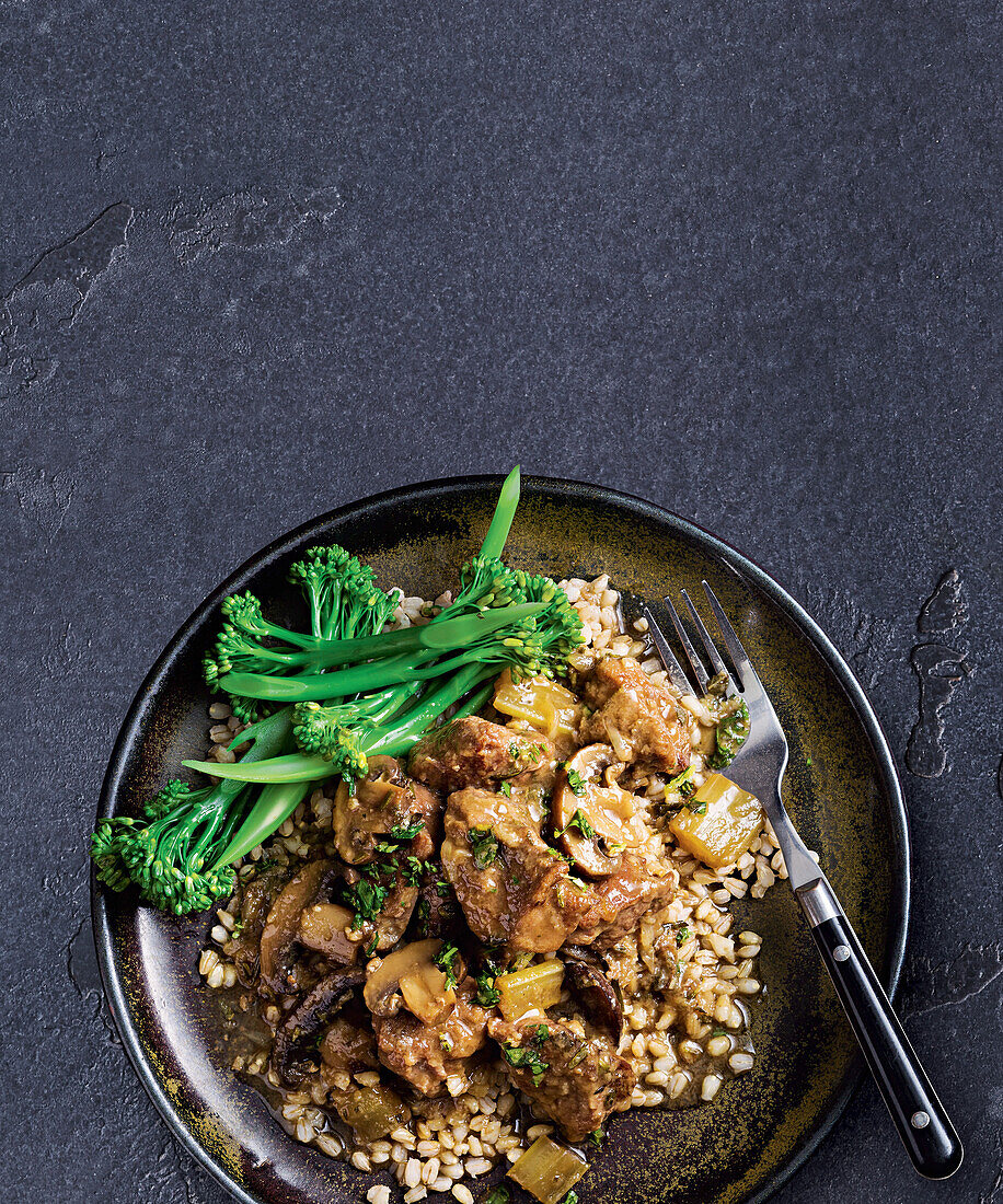 Pork and mushroom casserole with broccolini and pearl barley