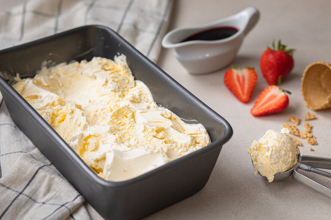 Homemade vanilla ice cream with fresh strawberries