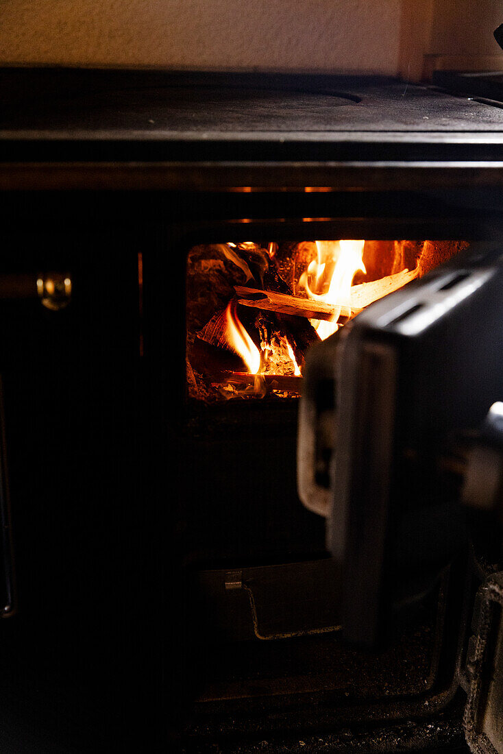 View into burning wood stove