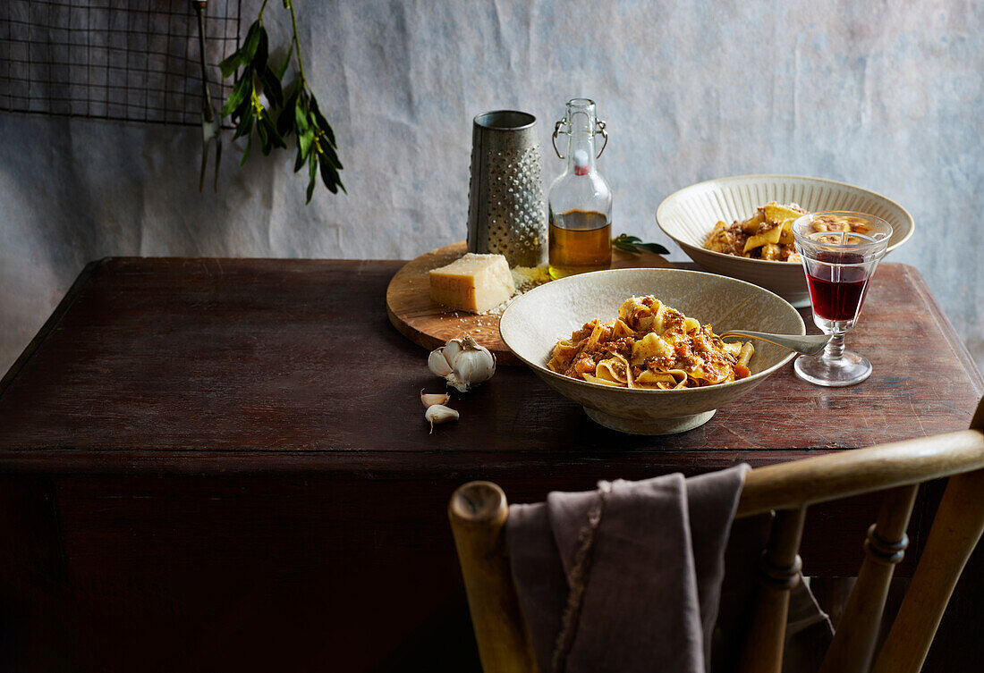 Pasta with meat sauce and grated cheese