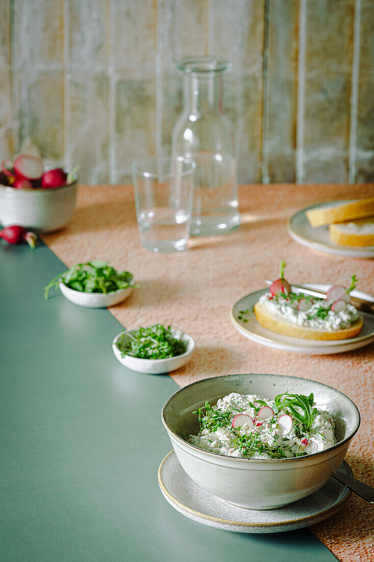 Cream cheese with cress, rocket and radishes