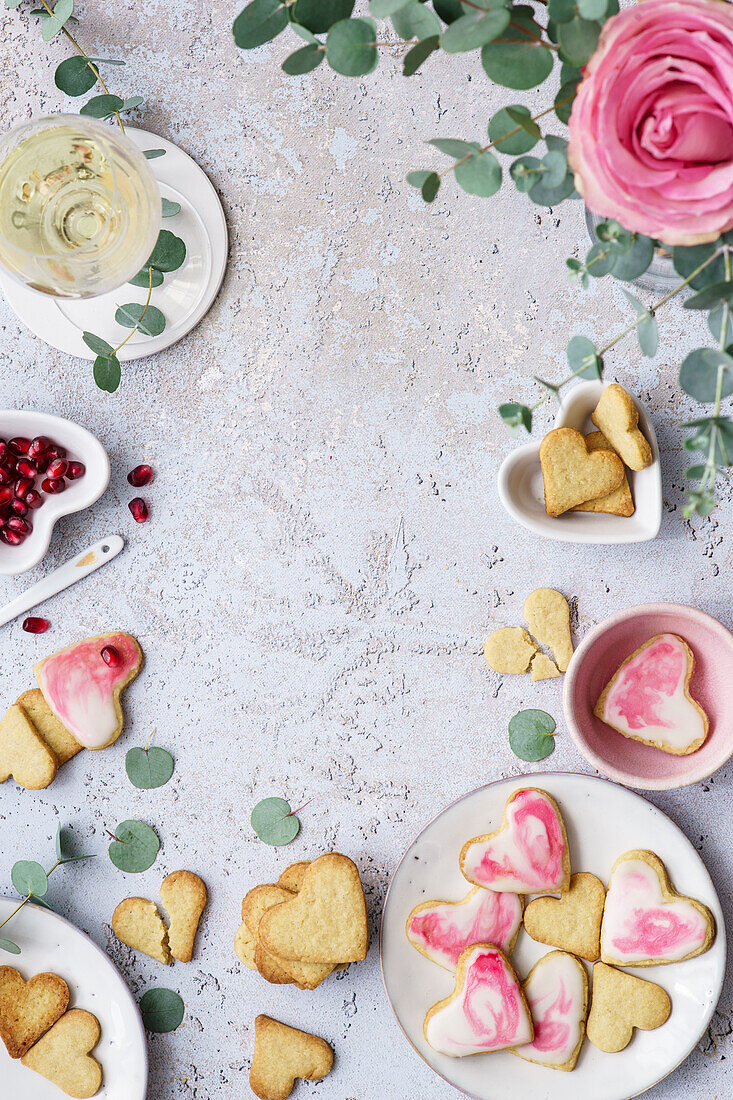 Heart-shaped biscuits with pomegranate icing