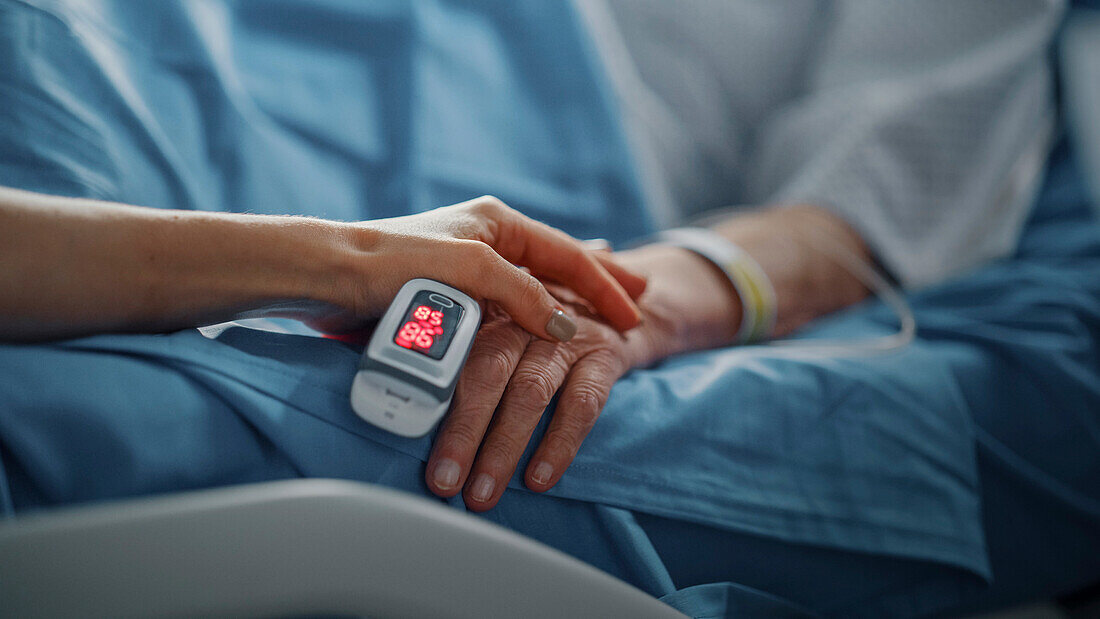 Family member comforting patient