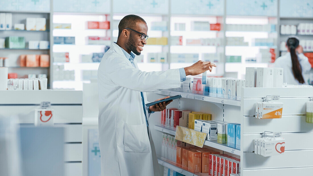 Pharmacist checking inventory