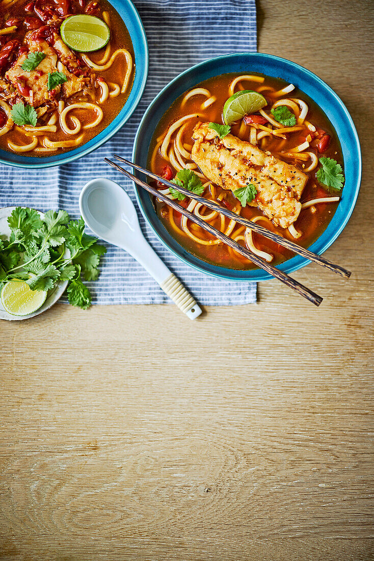 Poached hake in tomato, chilli and ginger broth