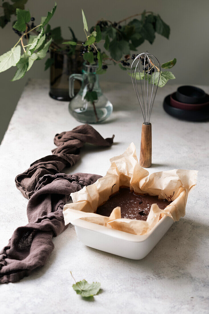 Pour chocolate ganache into baking tin