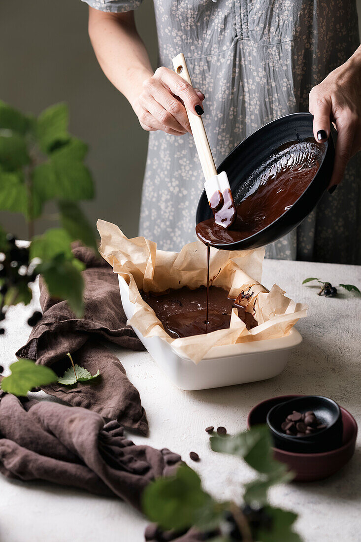 Pour chocolate ganache into baking tin