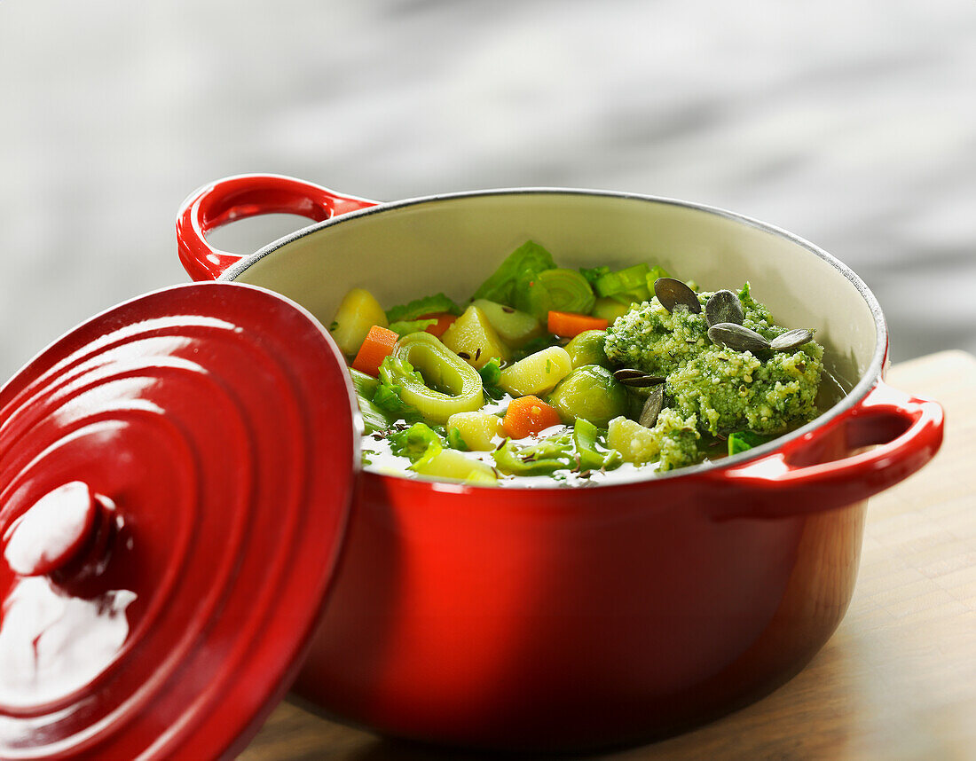 Winter vegetable pot with broccoli, leek, carrots, potatoes and pumpkin seeds