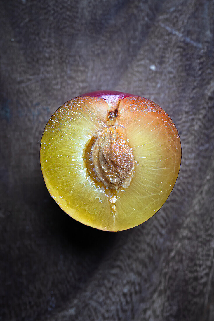 Close-up of a halved plum