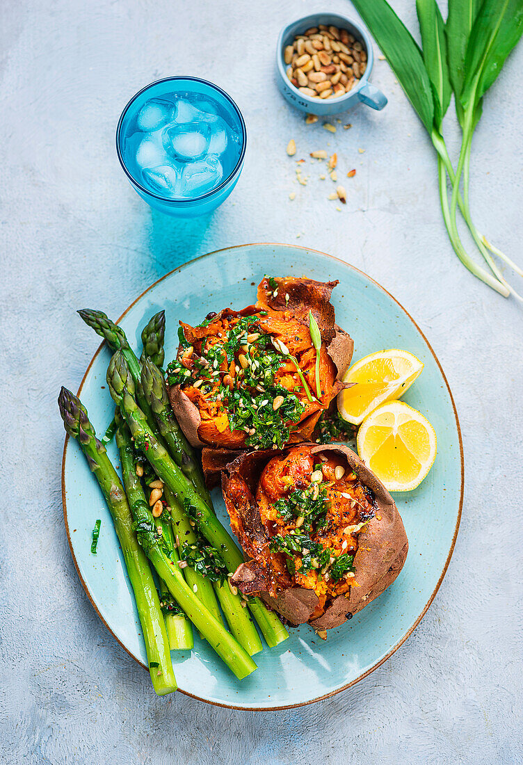 Sweet potato kumpir with green asparagus and wild garlic gremolata