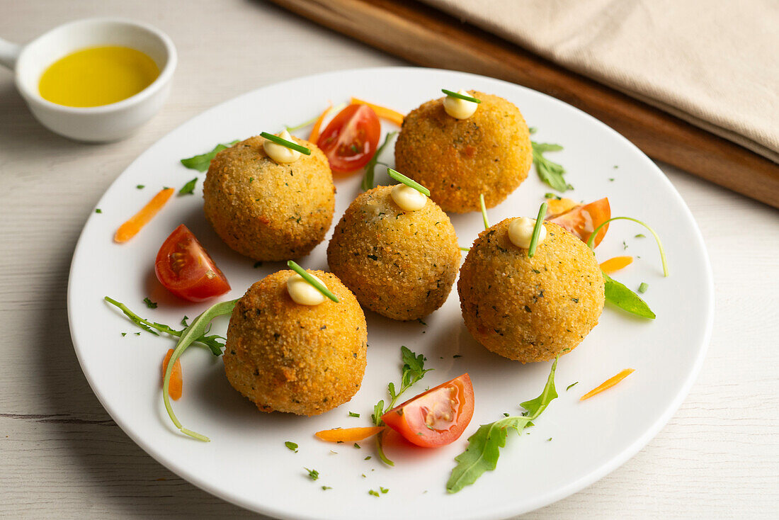 Spanish croquettes filled with ham and béchamel sauce