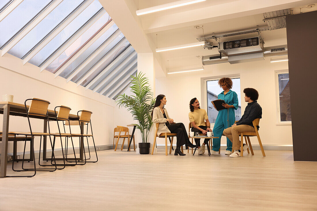 Creative team having meeting in modern studio