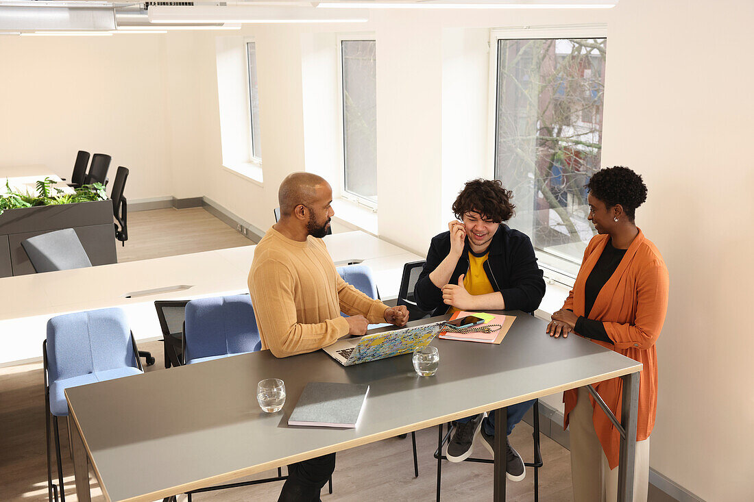 Creative team having meeting in modern office