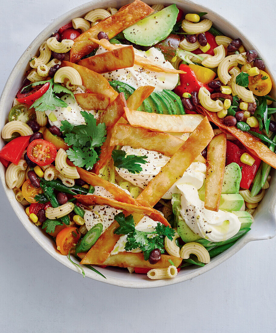 Burrito pasta salad with avocado, sweetcorn and beans