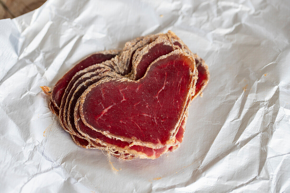 Heart-shaped slices of Bündnerfleisch