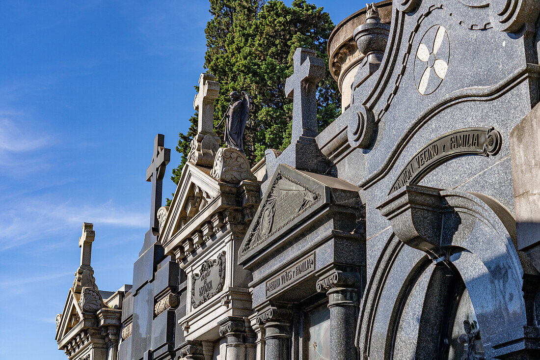 Crosses on elaborate tombs or mausoleums in the Recoleta Cemetery, Buenos Aires, Argentina.