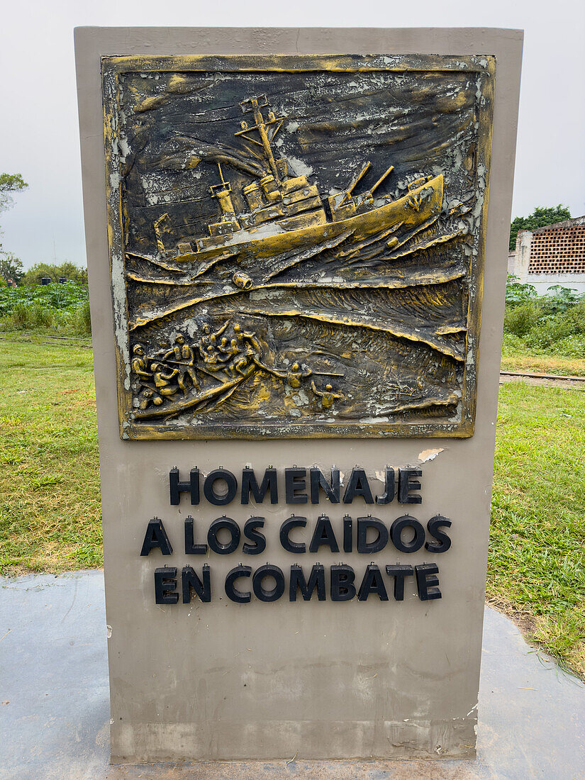 A memorial to the Malvinas War in San Jose de Metan, Argentina. This plaque honors those soldiers fallen in combat. It depicts the sinking of the cruiser ARA General Belgrano. The inscription translate "Homage to the fallen in combat."