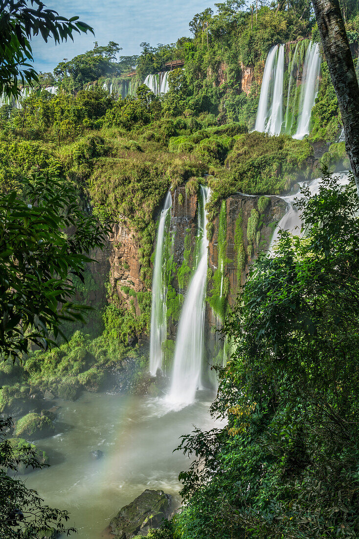 Iguazu Falls National Park in Argentina. A UNESCO World Heritage Site. Pictured are the Adam and Eve Falls with a faint rainbow.