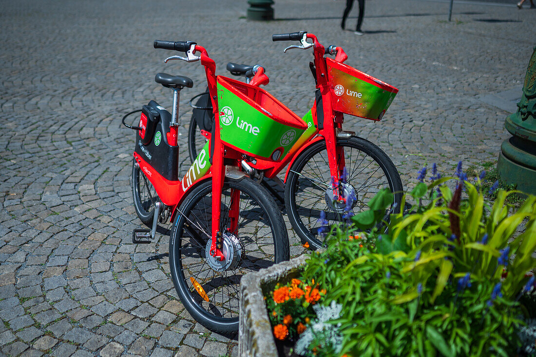 Parked Lime rental bikes in Prague