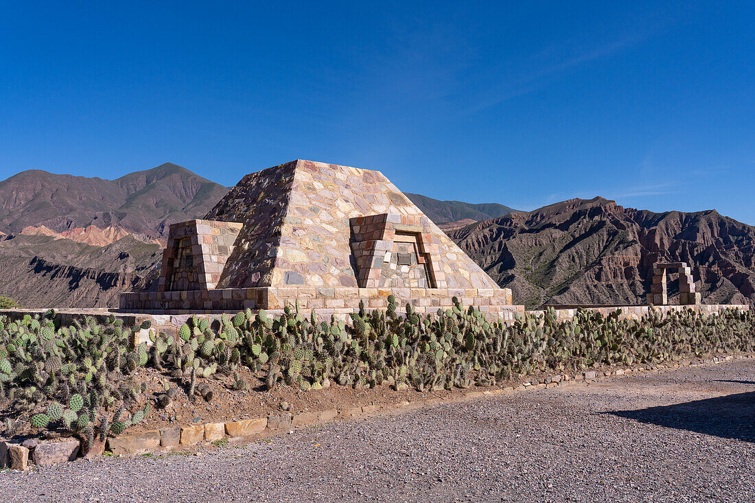 A modern pyramid built in the ruins in the Pucara of Tilcara, a pre-Hispanic archeological site near Tilcara, Argentina. The pyramid is a memorial to the archeologists who excavated the ruins.