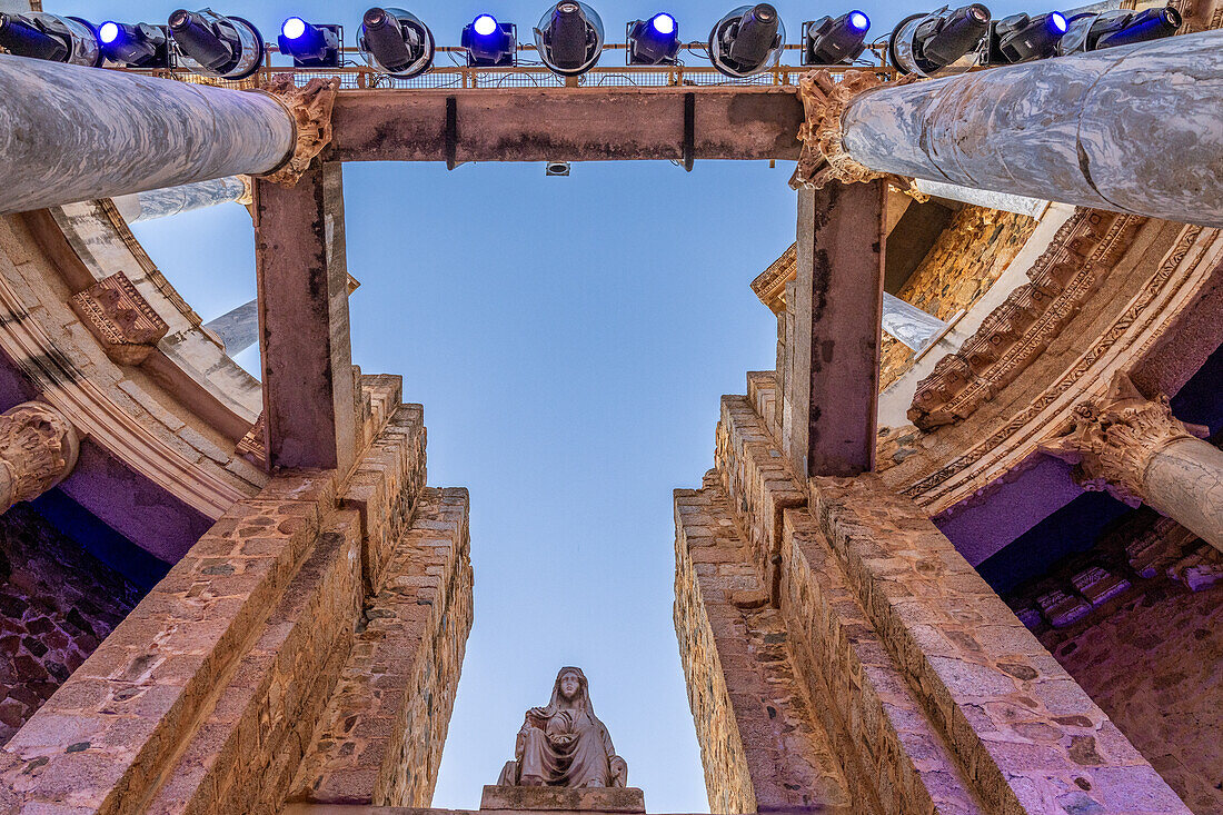 Merida, Spain, Aug 15 2024, View of the ancient Roman theater in Merida, Spain, showcasing architectural beauty as it is readied for a performance. Classical columns and statues create a dramatic atmosphere.