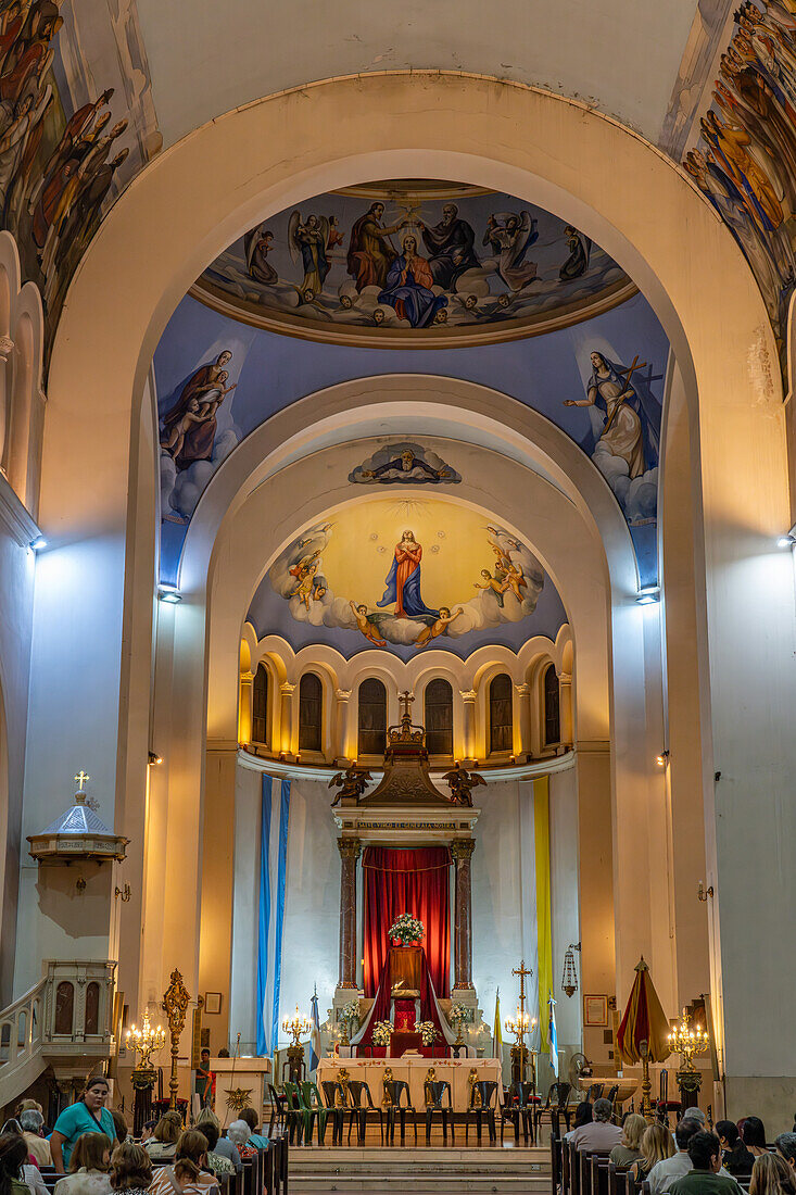 Worshippers in the nave of the Basilica de Nuestra Señora de la Merced, San MIguel de Tucumán, Argentina.