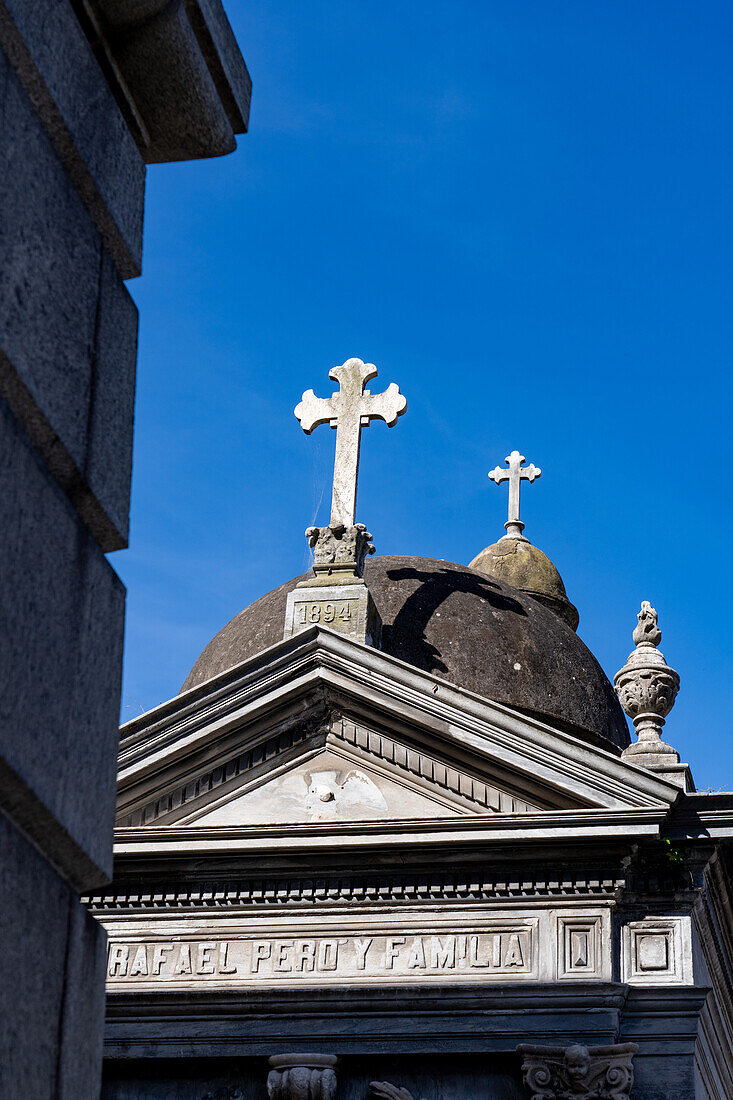 Crosses on elaborate tombs or mausoleums in the Recoleta Cemetery, Buenos Aires, Argentina.