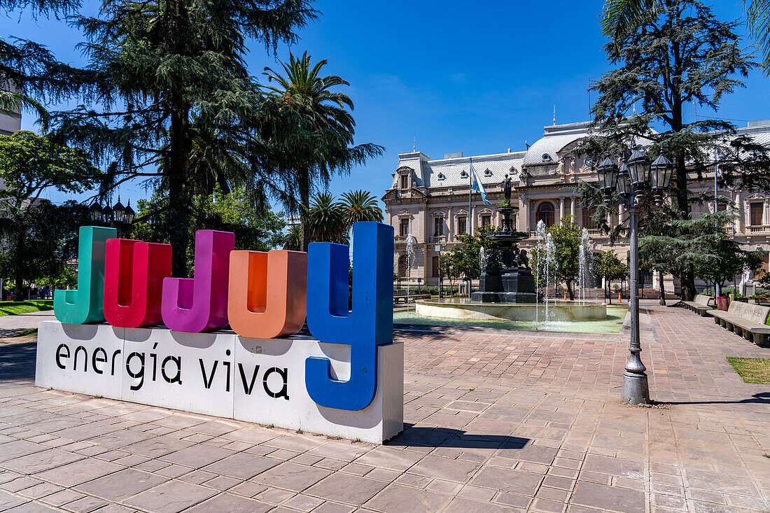 A sign for Jujuy in Plaza Belgrano in front of the Jujuy Government Palace in San Salvador de Jujuy, Argentina.