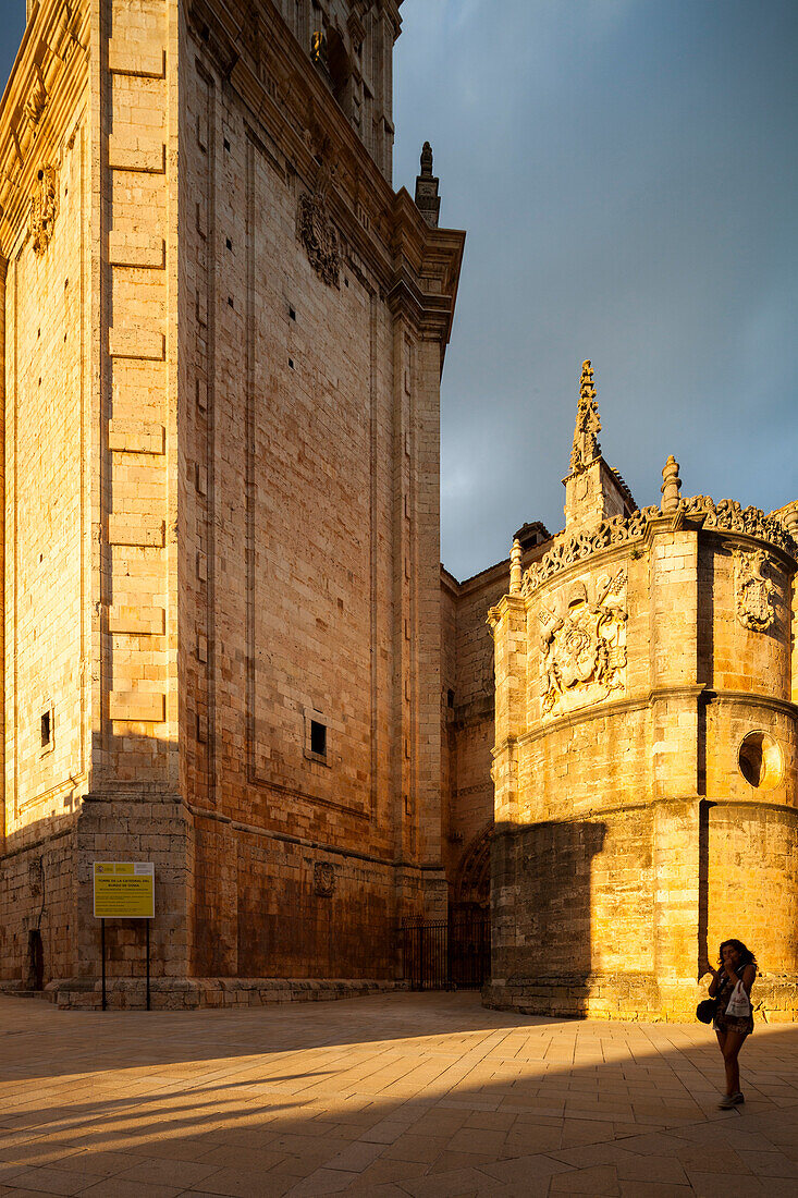 Burgo de Osma, Spain, Aug 12 2009, The setting sun casts warm light on the Cathedral\'s stone facade in El Burgo de Osma, showcasing its historic architecture.