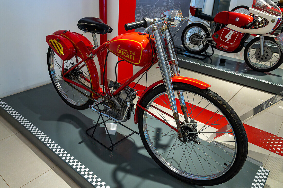 A vintage 1947 Ducati Cucciolo T50 motorcycle in the Automobile Museum of Termas de Rio Hondo, Argentina.