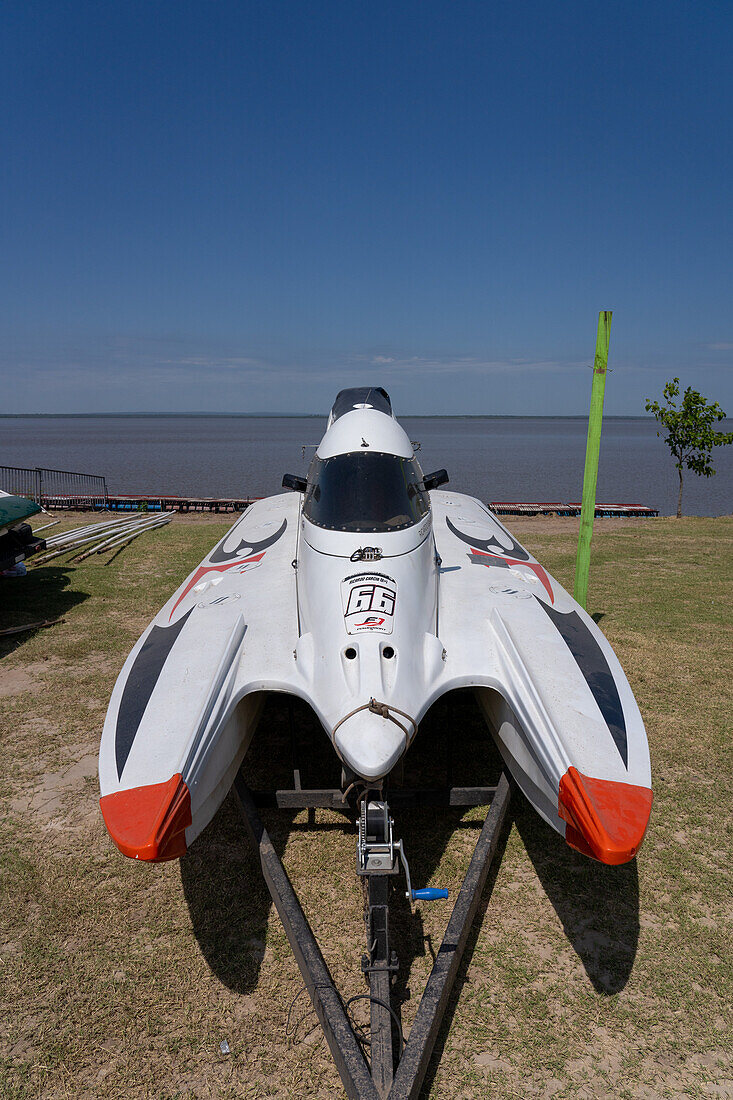 Frontal view of a racing boat on land before an F1 Powerboat race in Dique Frontal, Termas de Rio Hondo, Argentina.