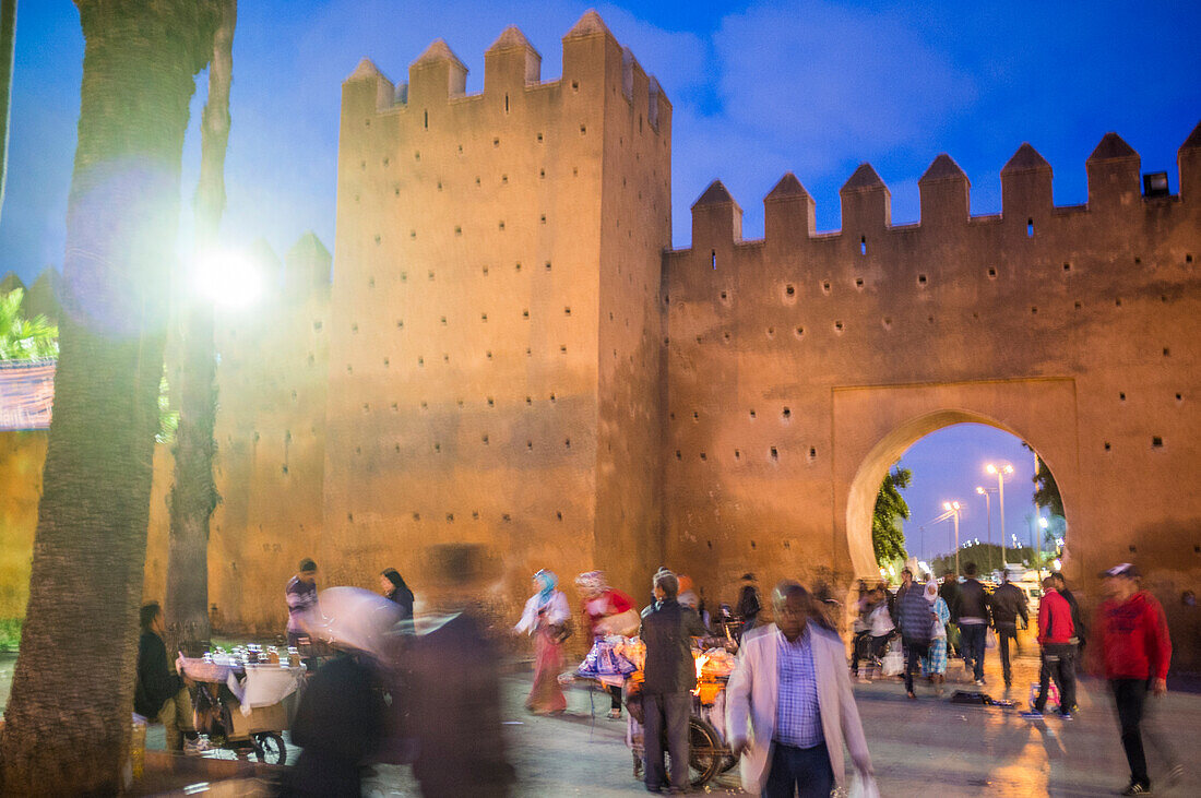 Rabat, Morocco, Apr 24 2015, Visitors stroll around Bab el Had Square, admiring the ancient Medina walls in Rabat while enjoying the local atmosphere and markets nearby.