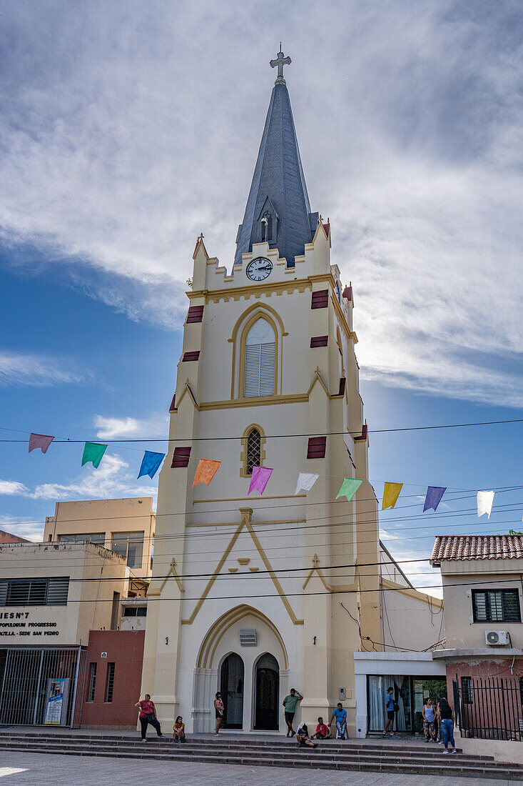 St. Peter the Apostle Church in San Pedro de Jujuy, Argentina, with people in front.