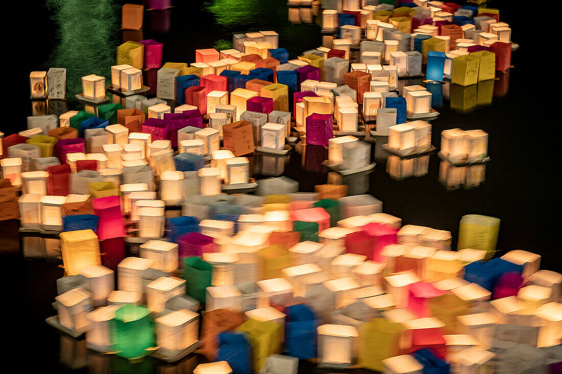 Lanterns on the river, in front of Atomic Bomb Dome with floating lamps on Motoyasu-gawa River during Peace Memorial Ceremony every August 6 in Hiroshima, Japan