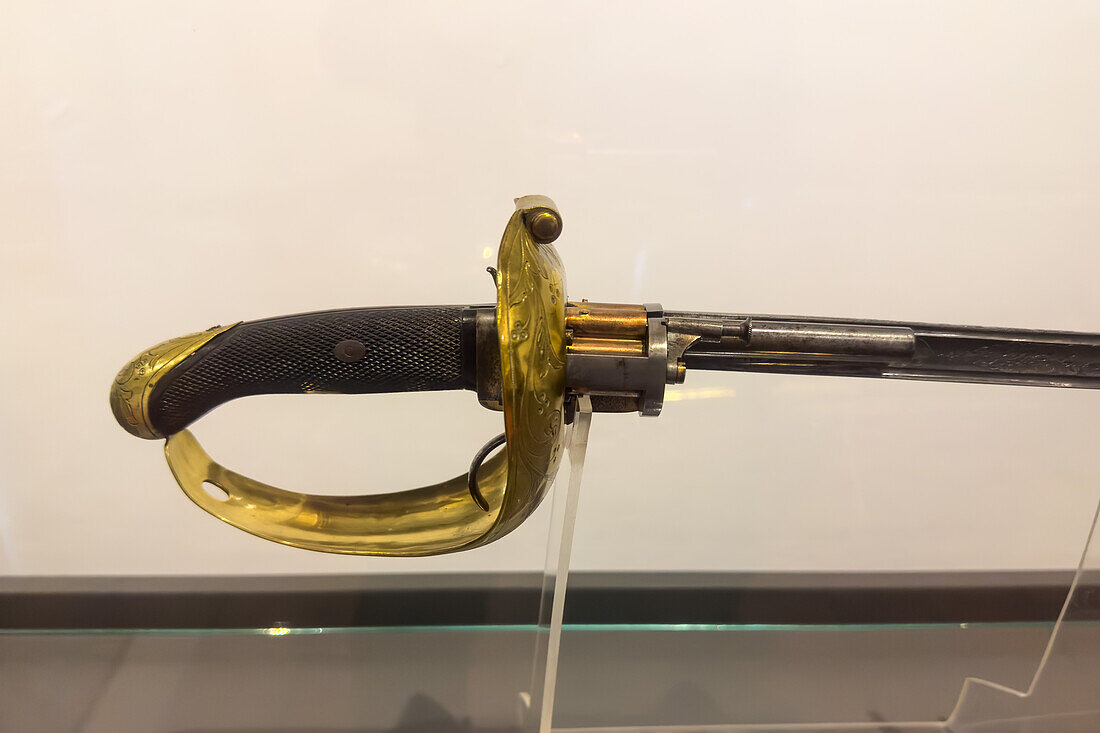 A combination sabre revolver from the 1800s. Juan Lavalle Historical Provincial Museum, San Salvador de Jujuy, Argentina. The pistol is built into the sword handle.