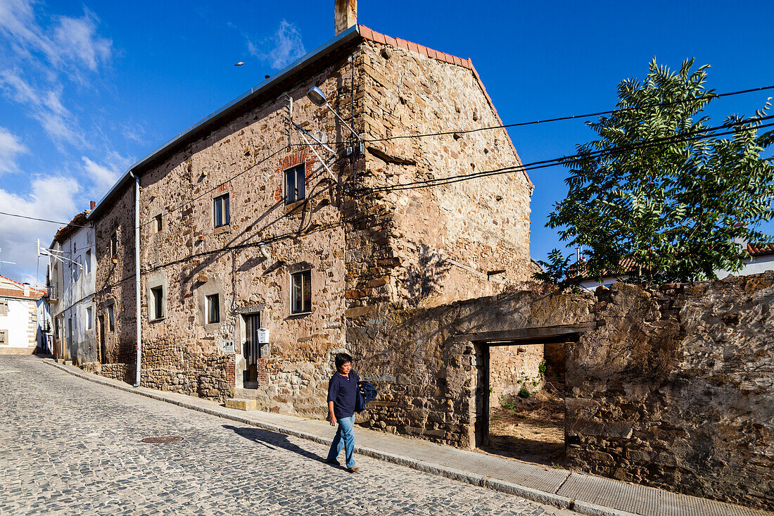 Soria, Spain, Aug 13 2009, Explore the charming streets of Almarza, where historical buildings showcase traditional Spanish architecture under a clear blue sky.