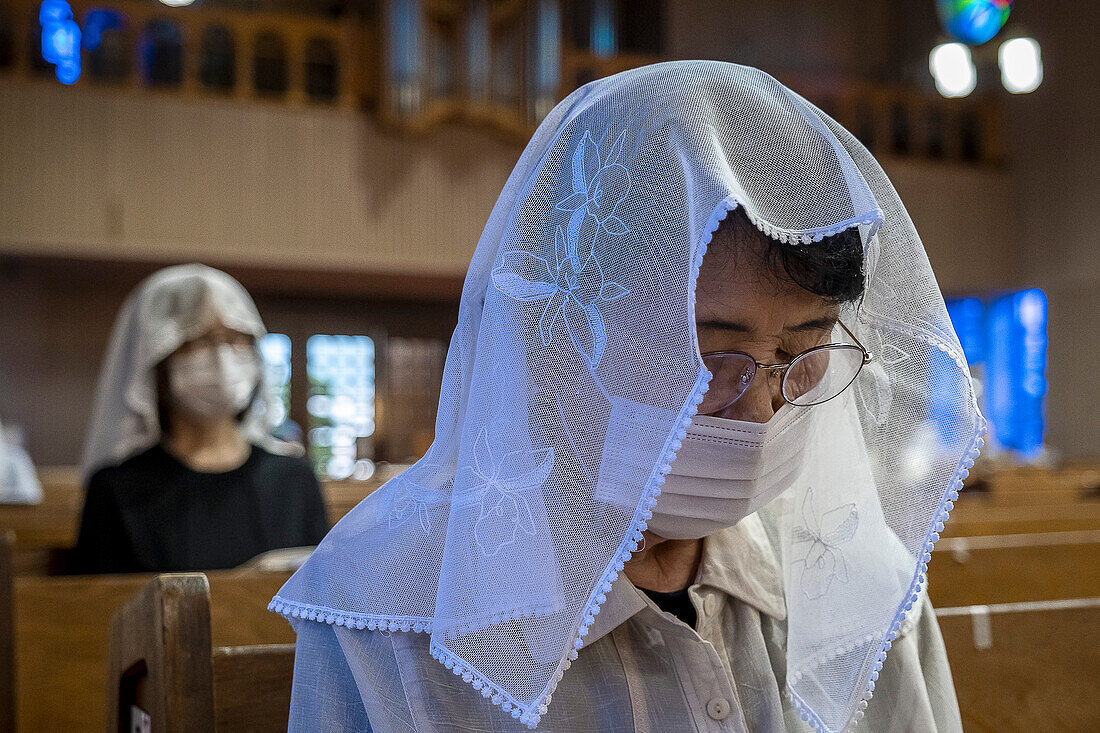 Morning mass on August 9th, every year, in memory of the victims of the atomic bomb. Urakami Cathedral, Nagasaki, Japan