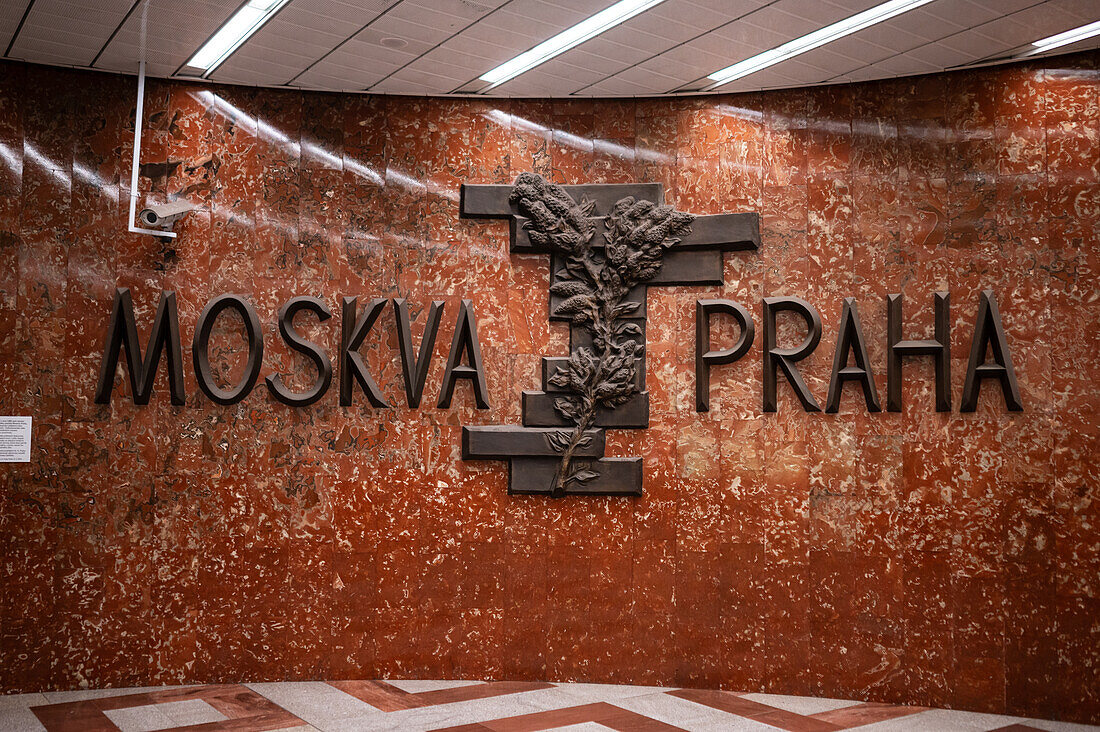 Soviet era Moskva-Praha sculpture in Andel Metro station of Prague