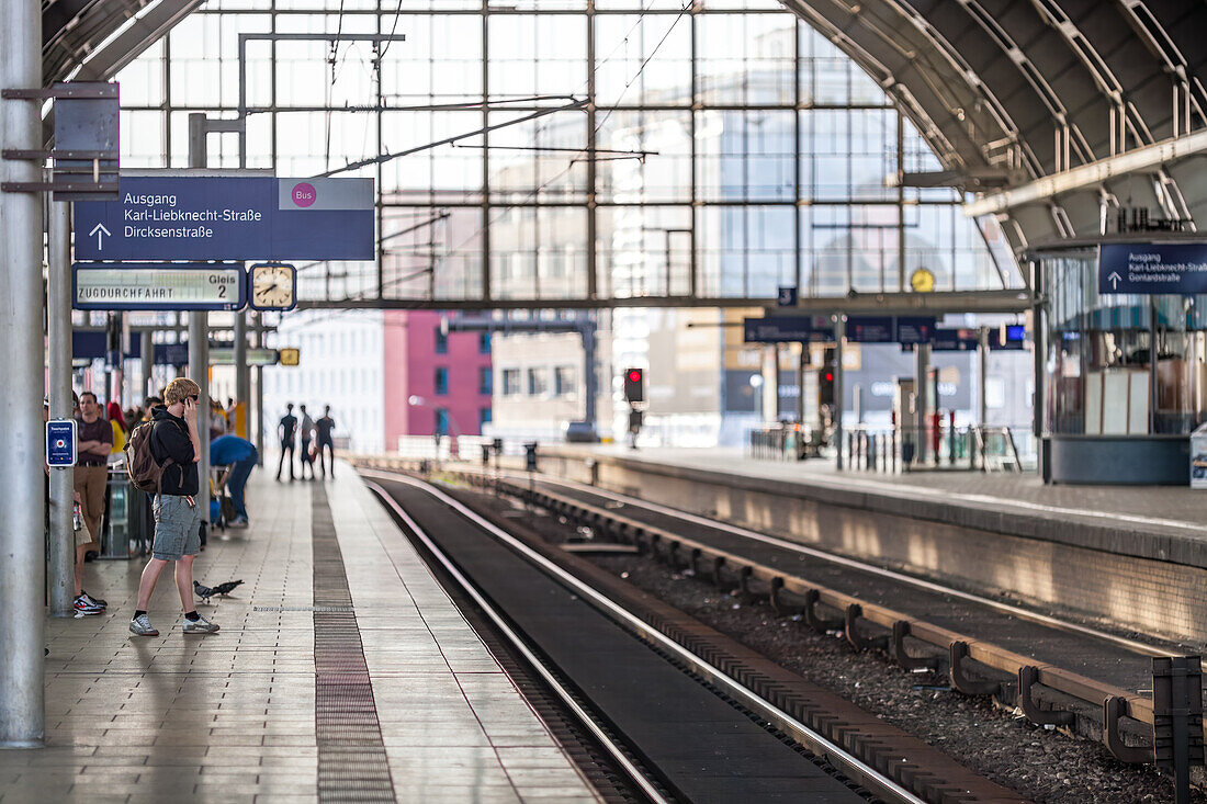 Berlin, Germany, July 27 2009, Passengers gather on the platform of Alexanderplatz railway station, a bustling transit hub in central Berlin.