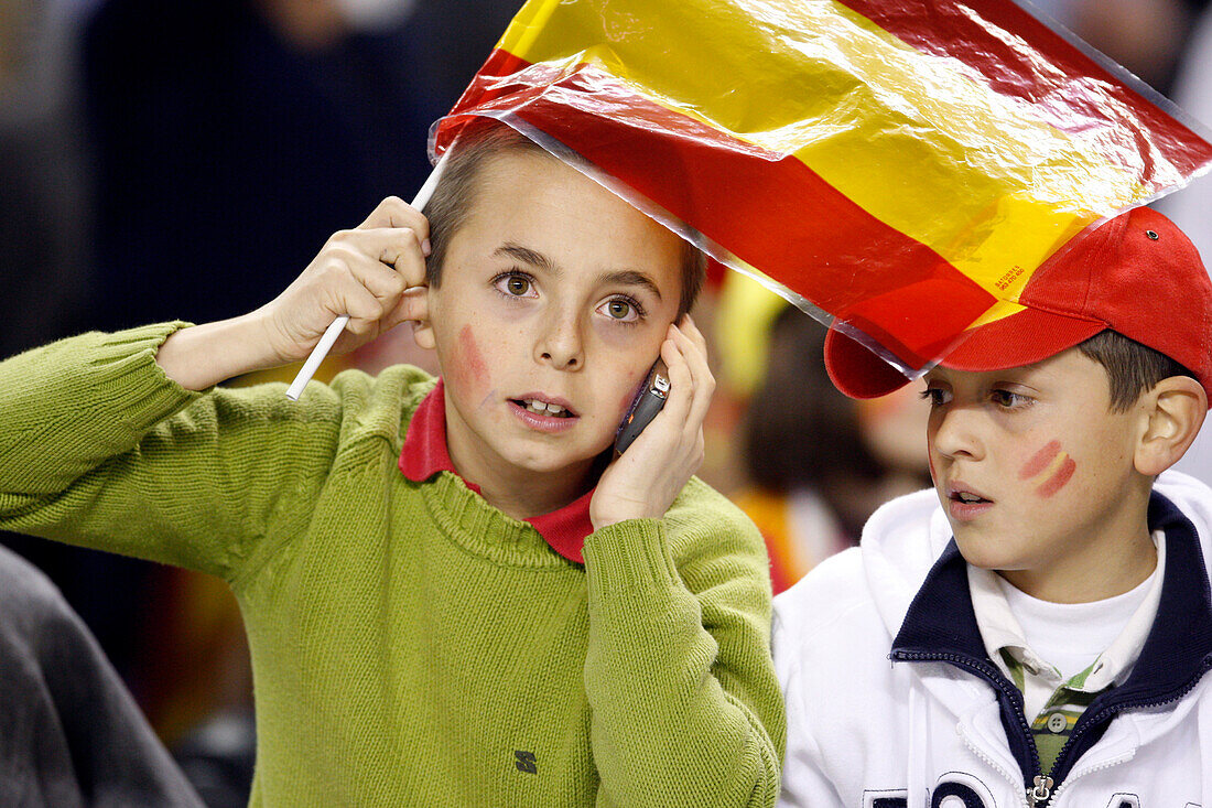 Seville, Spain, Feb 11 2009, Young supporters cheer for Spain during a friendly match against England at Sánchez Pizjuán Stadium in Seville.