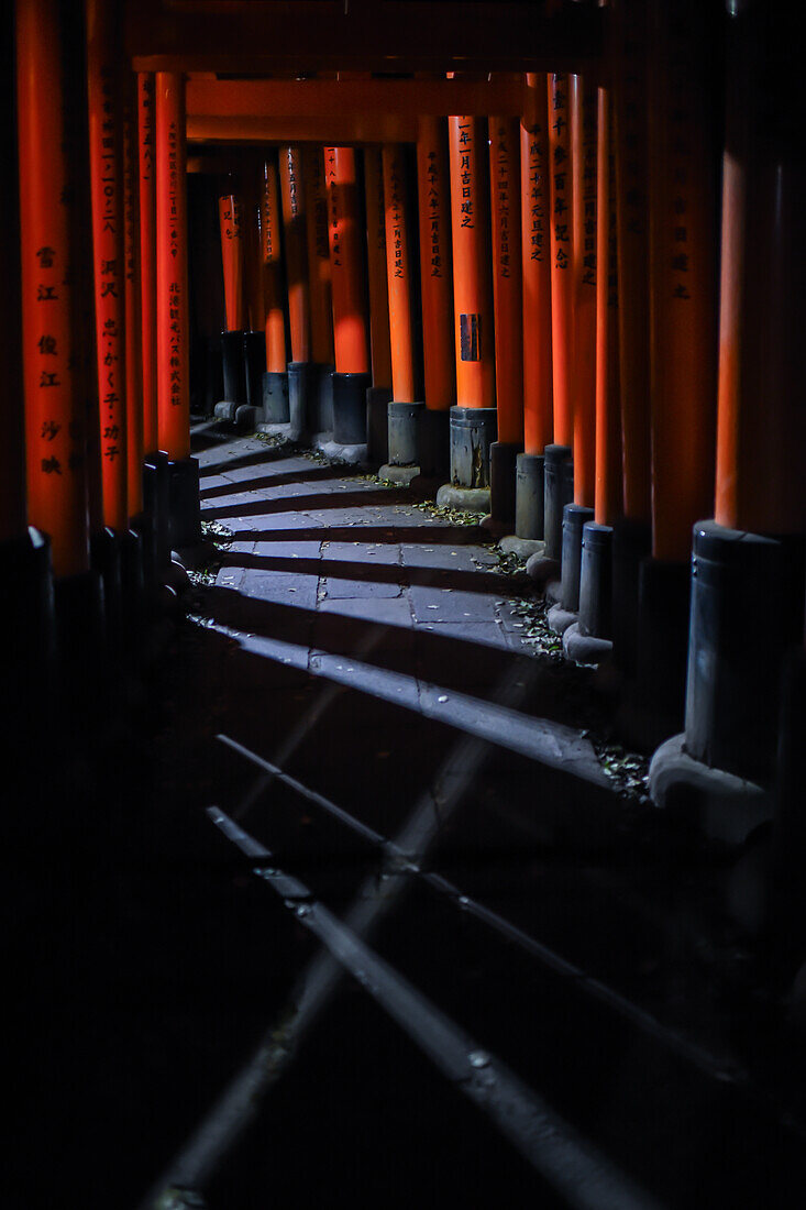 Exploring Fushimi Inari Taisha temple at night, Kyoto, Japan