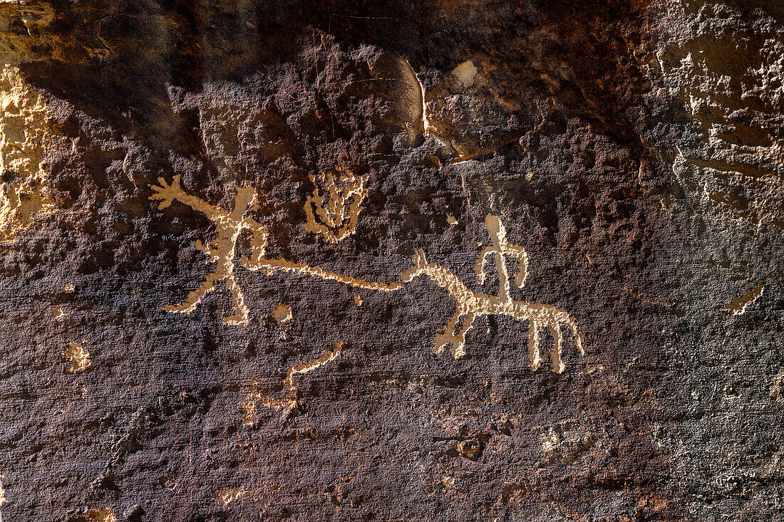 Two figures with a horse on an historic Ute Amerindian rock art panel in Nine Mile Canyon, Utah.