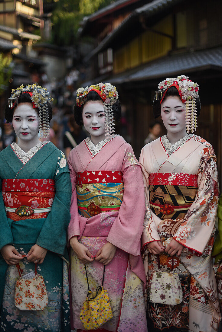 Group of women dressed as Maikos in the streets of Kyoto, Japan